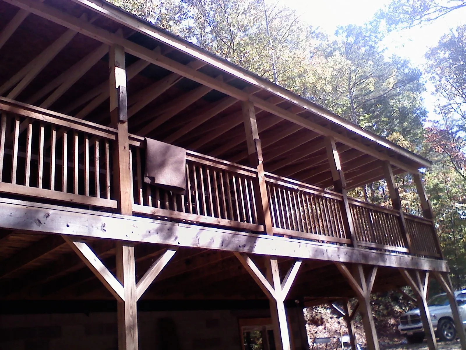 Timber framing under a new elevated porch and deck — Roof Leak Repair in Okmulgee by Roofing Brothers